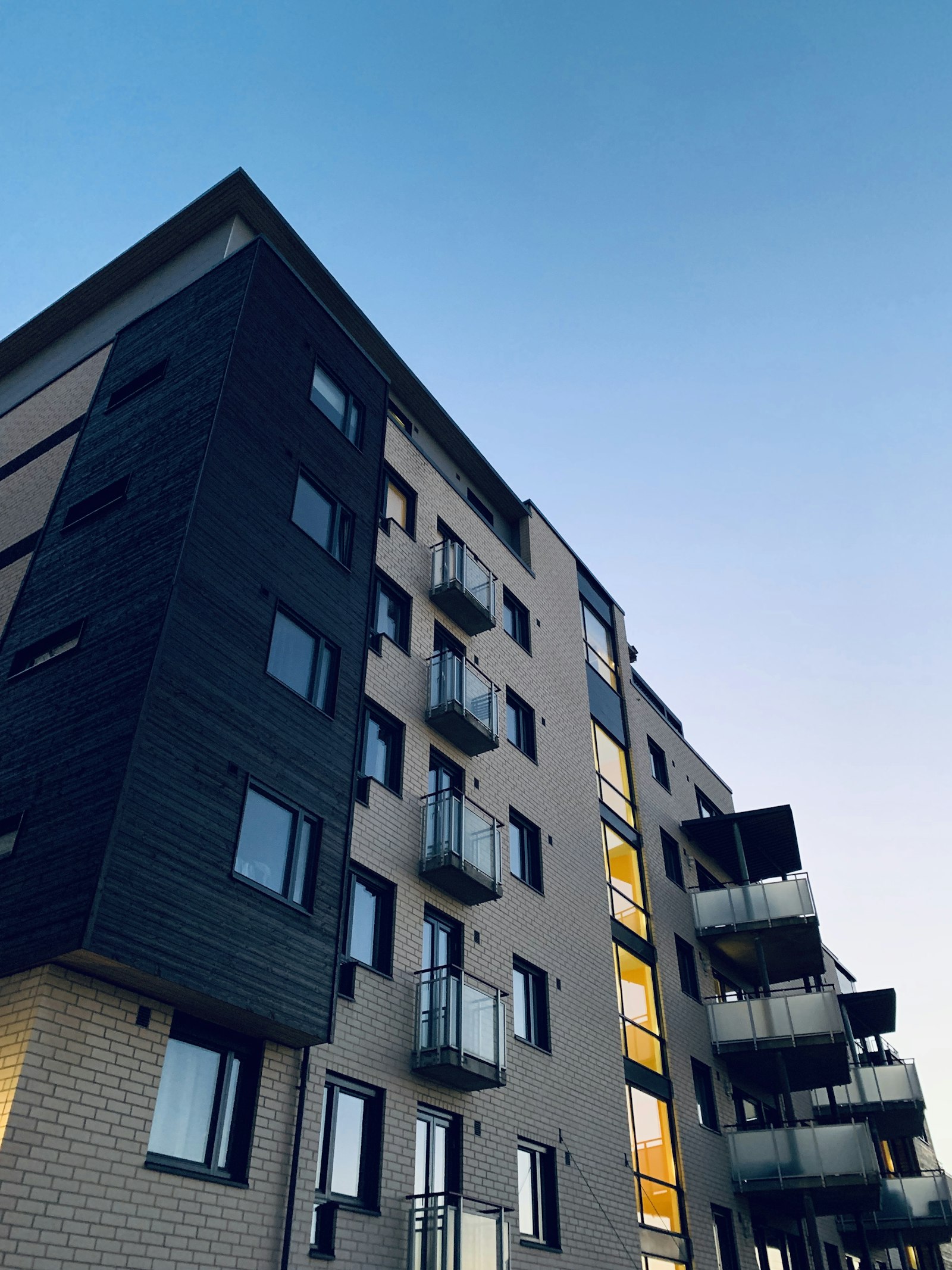 Modern residential building with balconies at dusk in Argentina